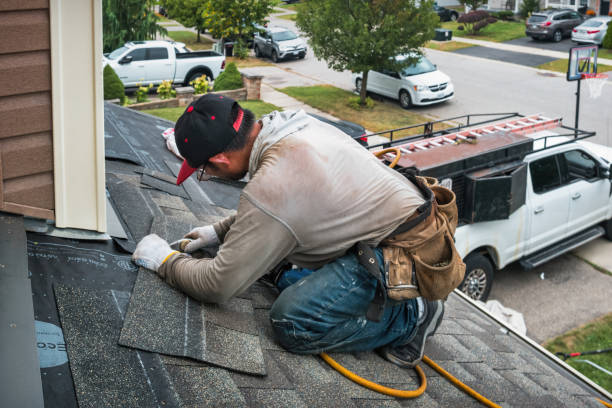 Professional Roofing technician working in Hampton, MD
